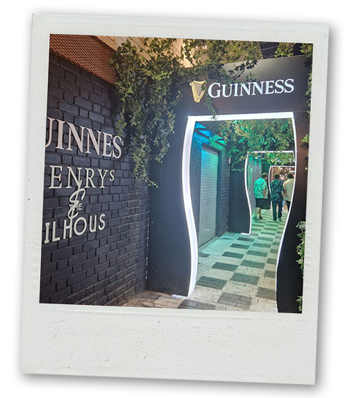 A Polaroid of a doorway reading Guinness