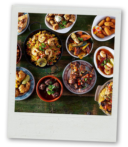 A Polaroid of a selection of tapas at Revolucion de Cuba
