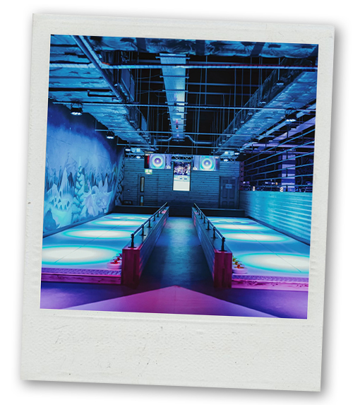 A Polaroid of a couple of ice free curling lanes at Roxy Lanes