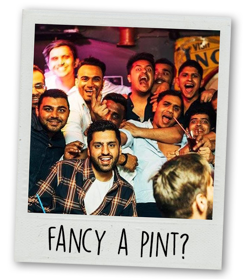 A Polaroid of a group of lads on a bar crawl with the caption Fancy A Pint?