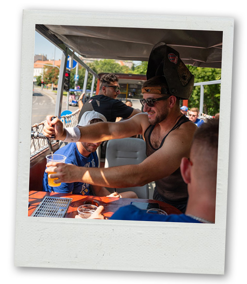 A Polaroid of a man helping himself from a self serve tap on the beer bus
