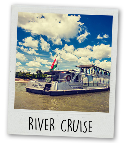 A Polaroid of a boat on a river with the caption River Cruise