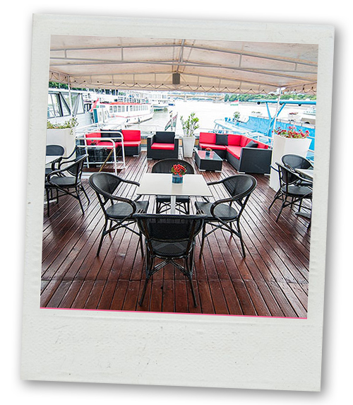 A Polaroid of some seating on a boat