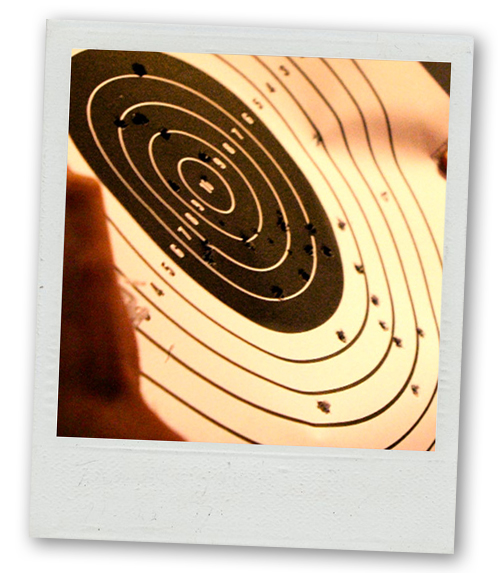A Polaroid of a target that has been shot at