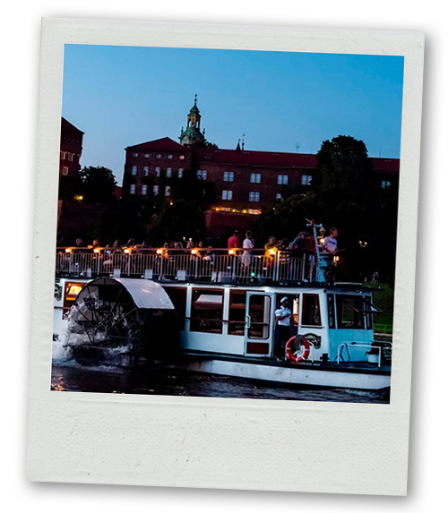 A Polaroid of a boat cruise at night
