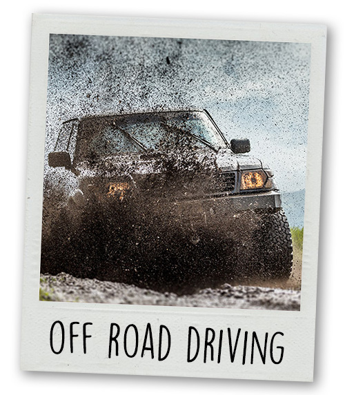 A Polaroid of a 4x4 in mud with the caption Off Road Driving