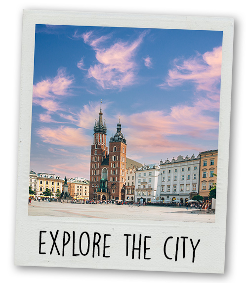 A Polaroid of Krakow's old town with the caption Explore the City
