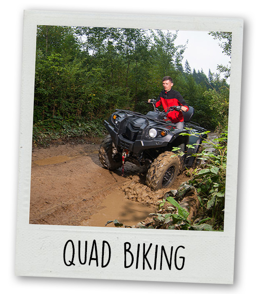 A Polaroid of a man quad biking with the caption Quad Biking