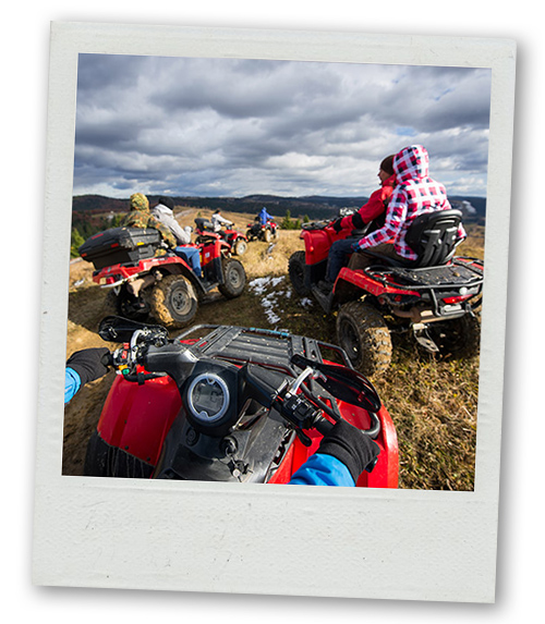 A Polaroid of a group of people on a Quad Biking trek