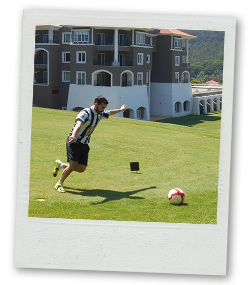 A Polaroid of a man doing a run up to kick a football