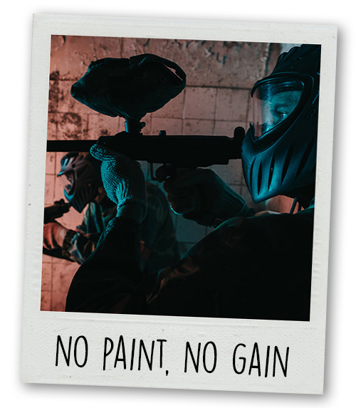 A Polaroid of a man aiming a paintball gun with the caption No Paint No Gain