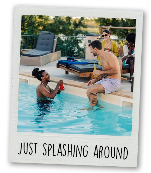A Polaroid of two men and a woman hanging out by the pool with the caption Just Splaishing Around