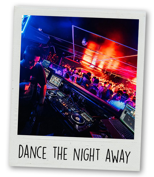 A Polaroid of a DJ playing to a crowd in Ollie's nightclub with the caption Dance the Night Away