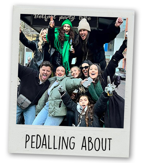 A Polaroid of a hen do group doing a pedi bike in Belfast with the caption Pedalling About