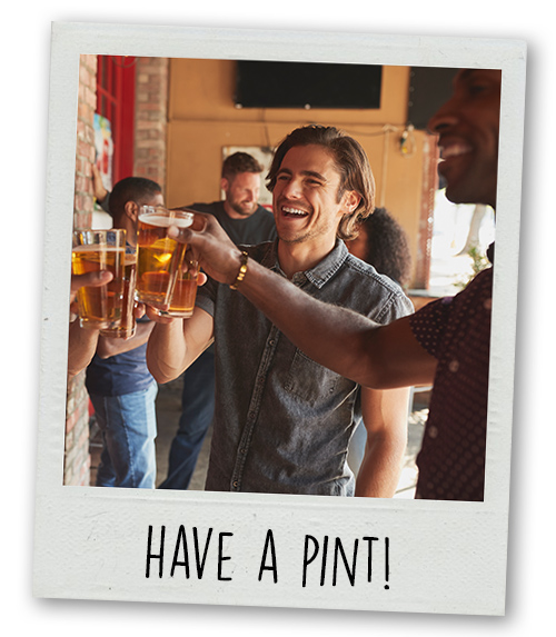A Polaroid of some men on a pub crawl with the caption have a pint