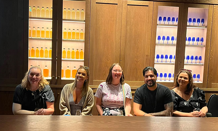 Some of LNOF staff sat in a grand looking room at the whisky experience