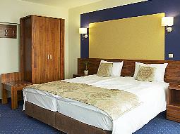 A guest room at Hotel Piast