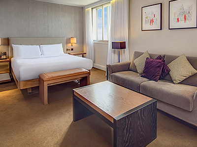 Two sofas around a wooden coffee table