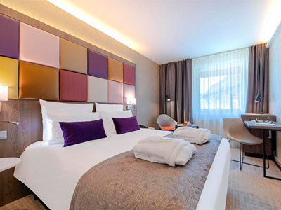 A king bed at Mercure Budapest Korona
