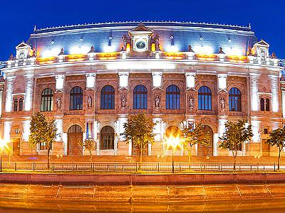 The illuminated exterior of X Hostel