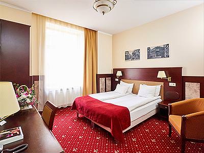 A spacious double room with red and gold colour scheme - Rank #4