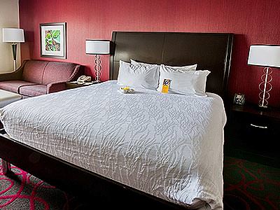 A guest room at the Hilton Garden Inn Dublin with a double bed