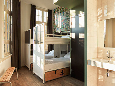 Two sets of bunk beds side by side at Generator Amsterdam