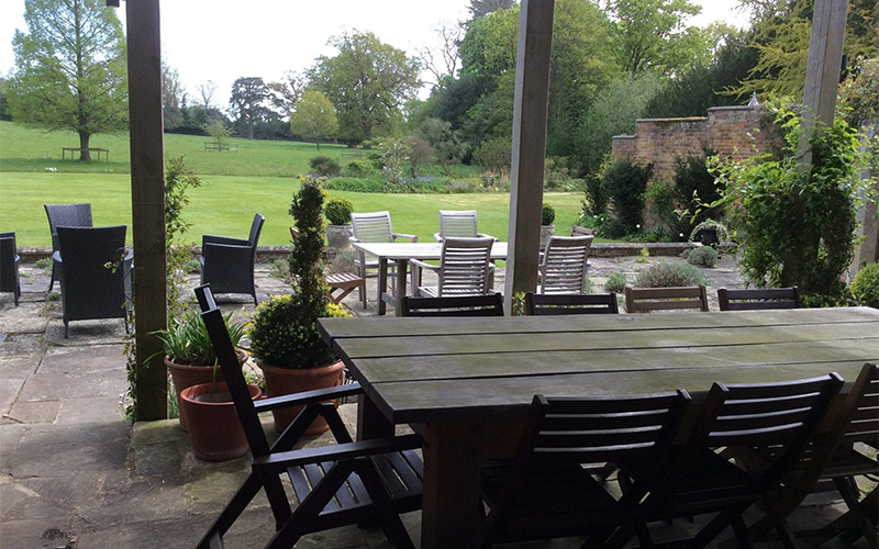Dine undercover with a garden view 