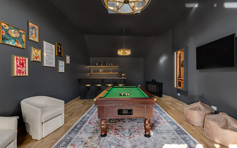The games room with a pool table 