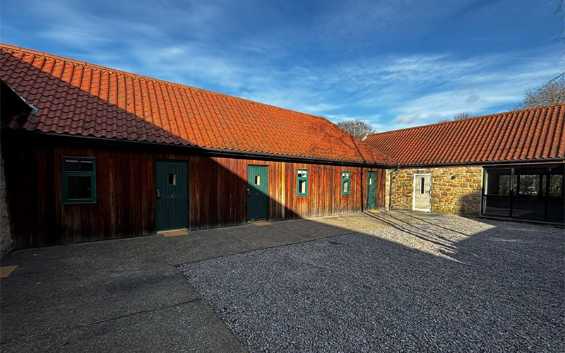 The exterior of The Stables 