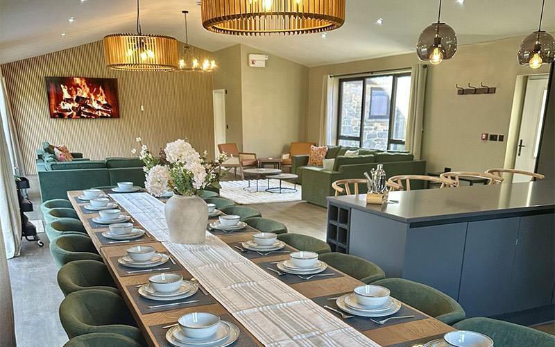 The long dining table seats 20 