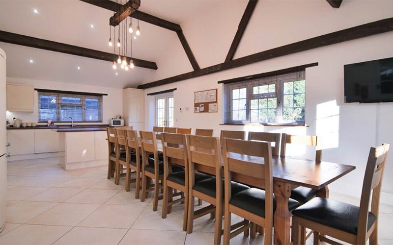 The kitchen and dining area complete with flatscreen TV 