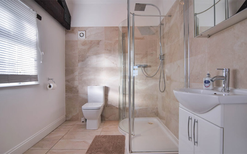 The bathrooms are bright and modern 