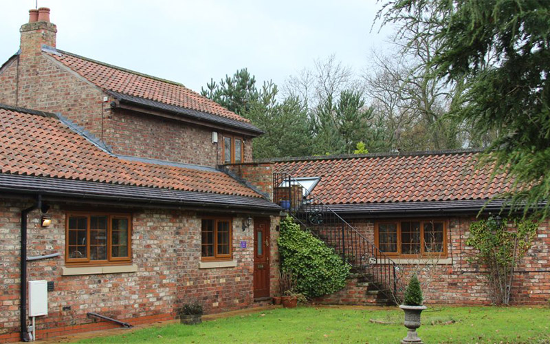 The exterior of the front of Roman Cottage 