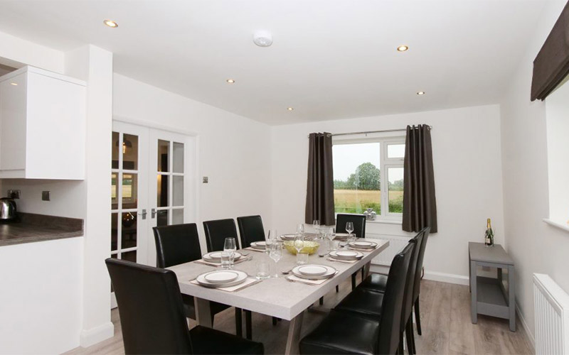 The dining table seats 8 so everyone can enjoy a meal together 