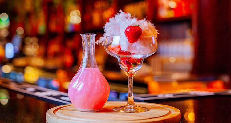 A pink cocktail with candyfloss and strawberries at the Botanical Garden Bar in Dublin