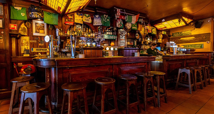 The interior of Hoopman which is an Irish pub with football shirt decor