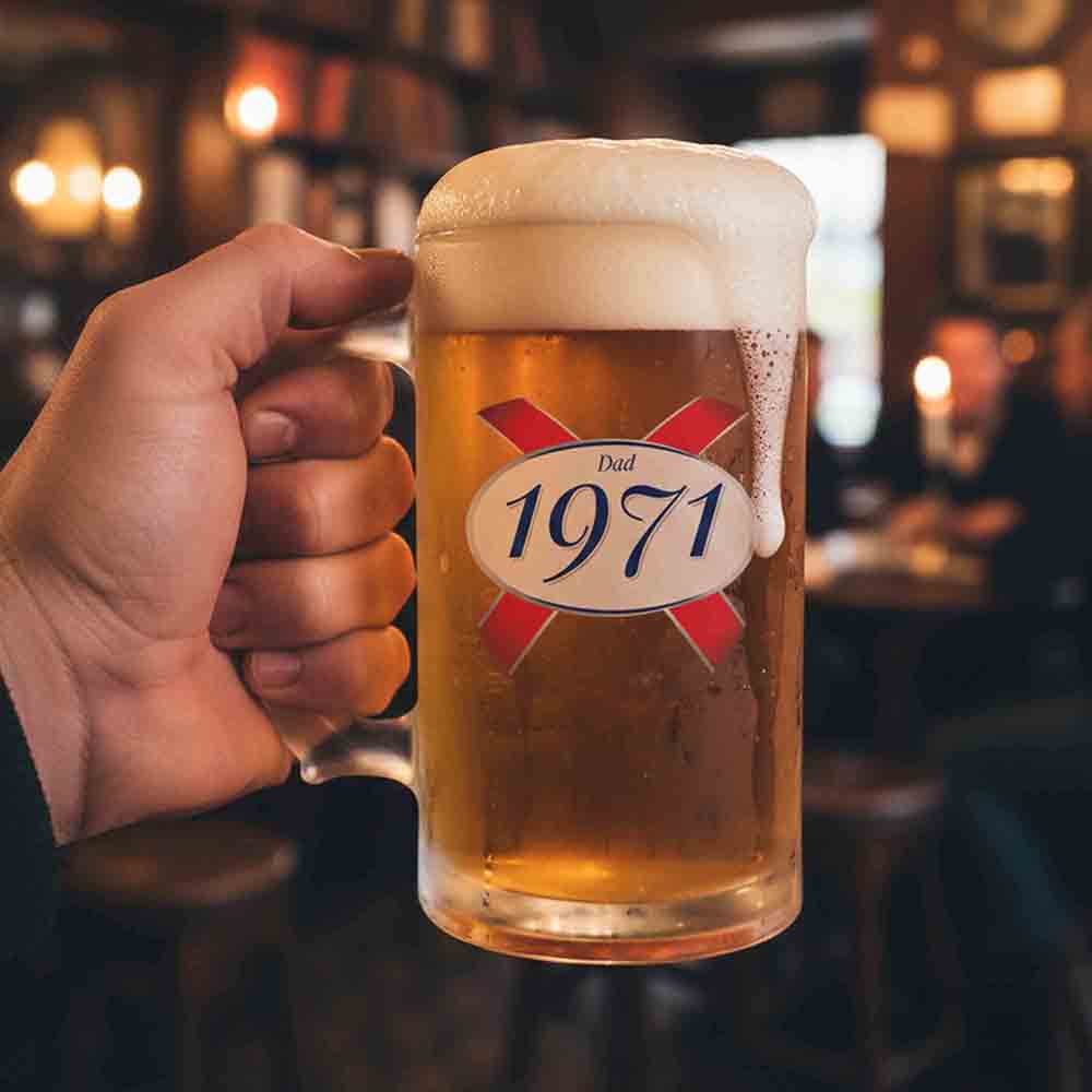 A custom Kronenbourg-inspired stein birthday with frosted glass that reads Dad 1971 with a pub background