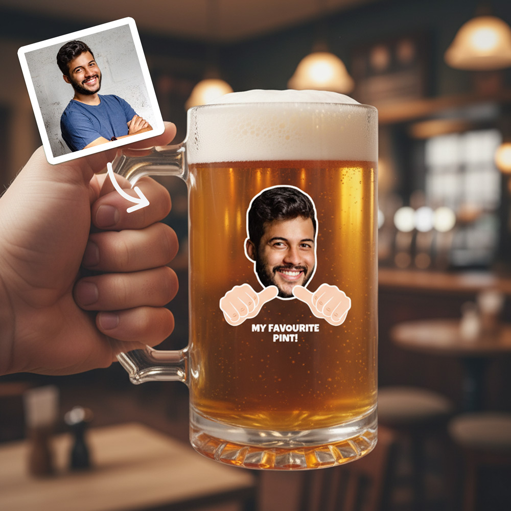 A custom stein that has been personalised with a man's face that have cartoon thumbs pointing towards him and custom text reading My Favourite Pint with a pub background