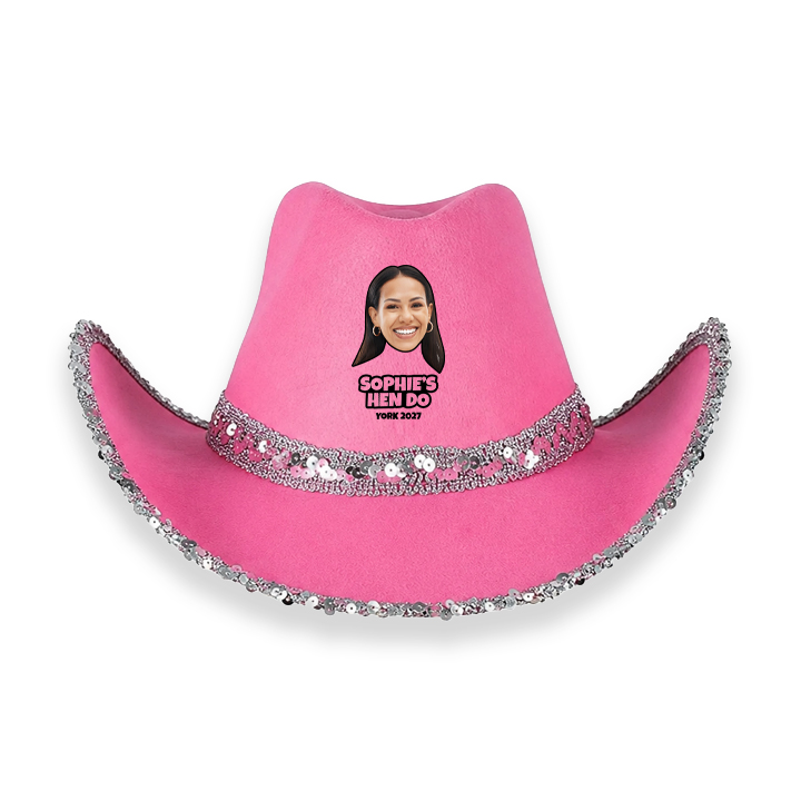 A custom novelty pink cowboy hat with a glittery silver trim which has been personalised with a face photo and 2 lines of custom text reading Sophie's Hen Do York 2027