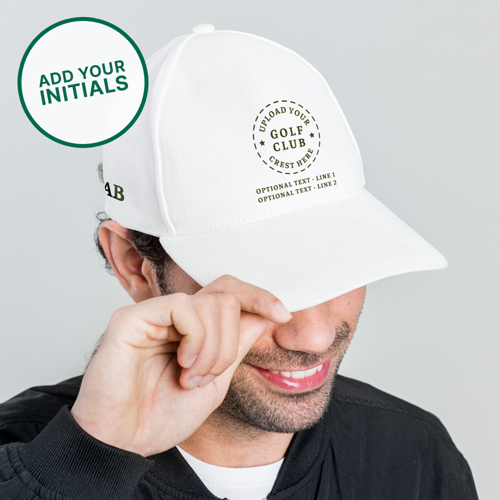 A side view of a male model wearing a golf cap that has a custom golf crest on it with the initials AB embroidered on the side
