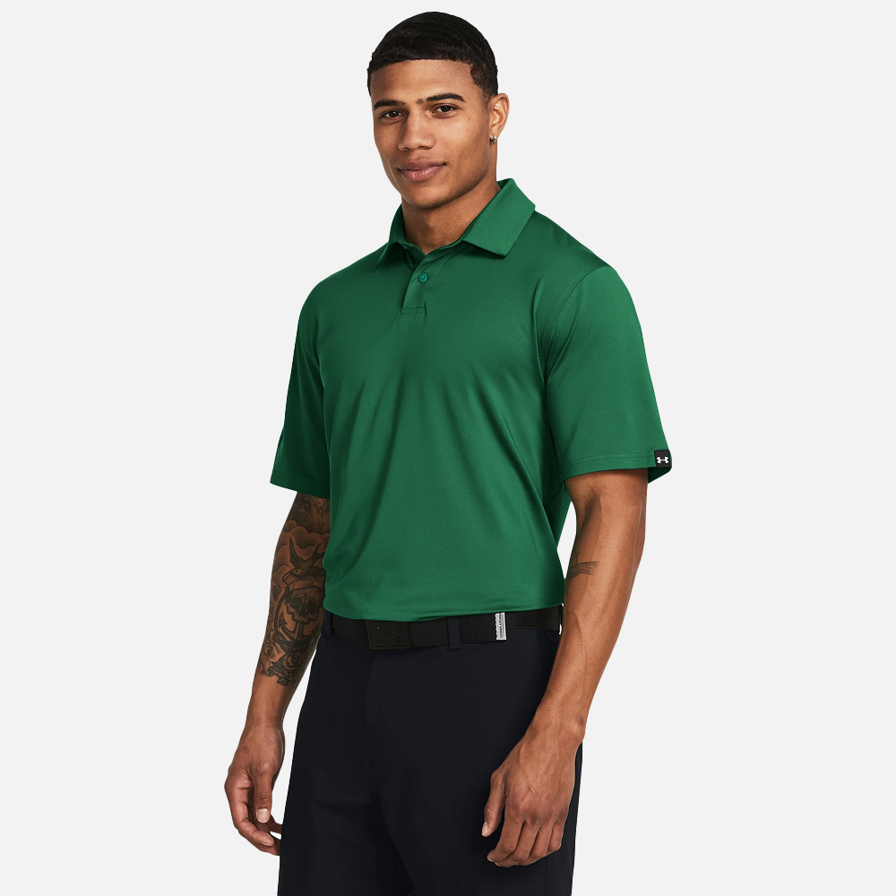 A male model wearing a green Under Armour - UA T2G polo