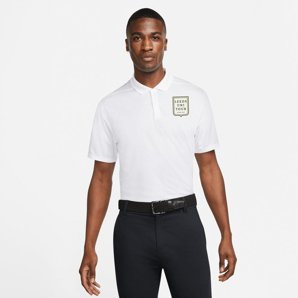 A male model wearing a white custom golf polo shirt with a society crest design that has been personalised with Leeds Uni Tour, Palma 2027
