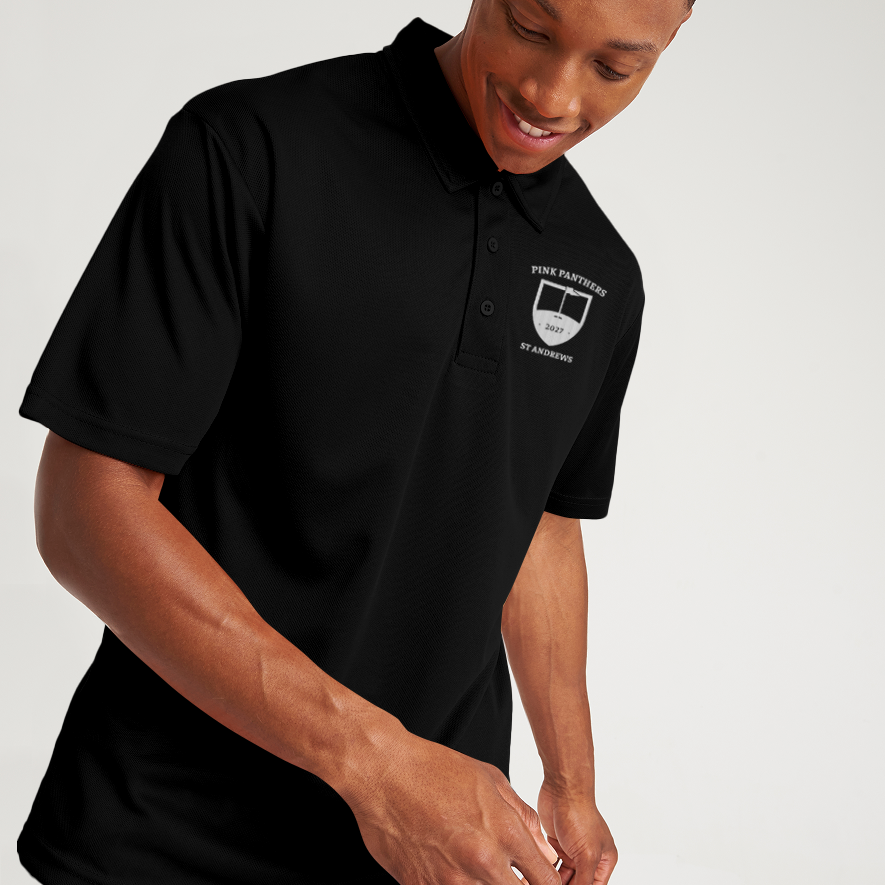 A male model wearing a custom golf polo with a tour crest design that has been personalised with Pink Panthers, 2027, St Andrews