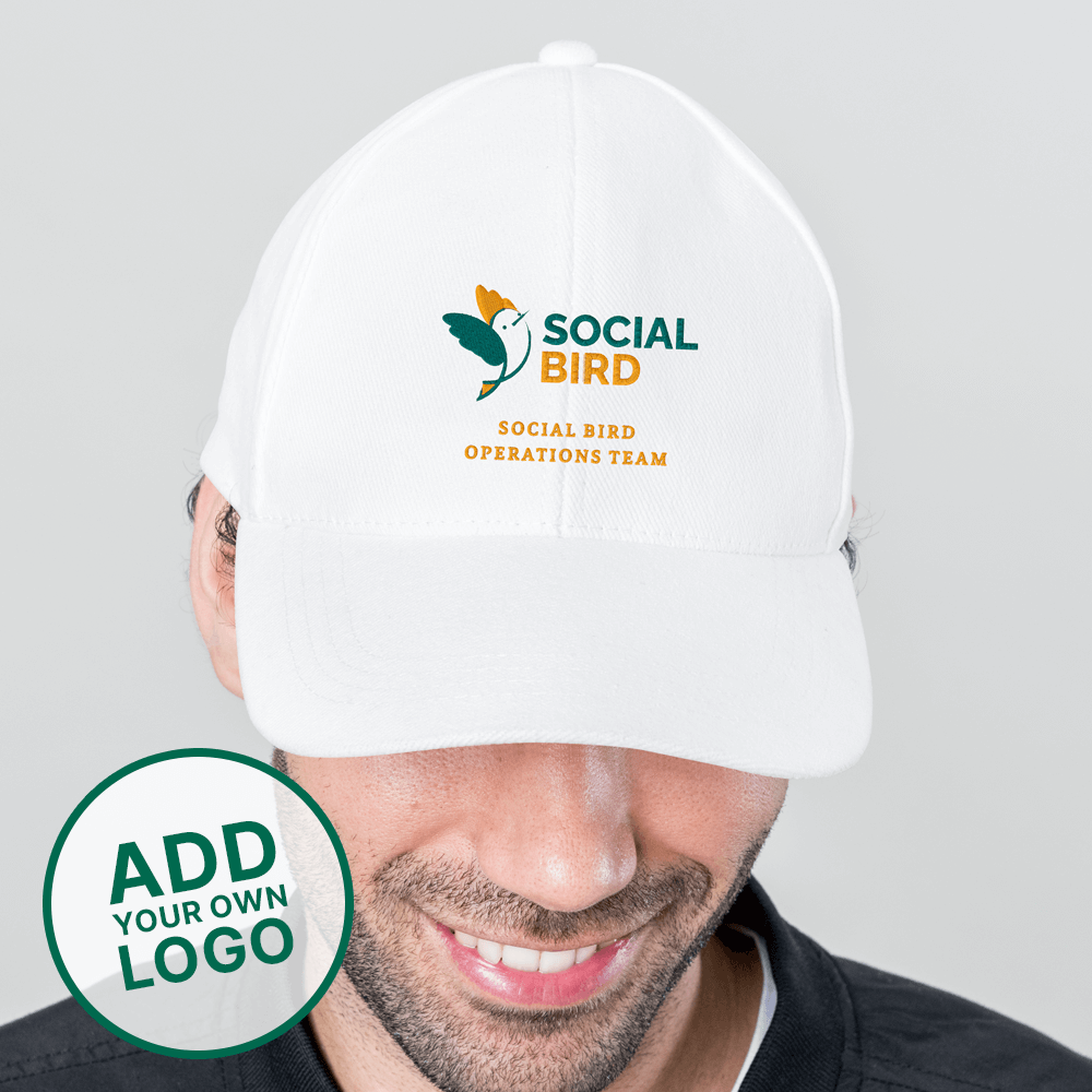A male model wearing a white golfing cap with a golf logo embroidered onto it reading social bird, social bird operations team