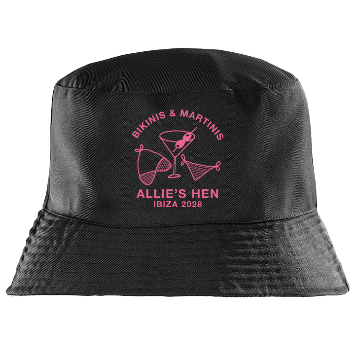 A custom hen do bucket hat in black with a Bikinis and Martinis graphic in pink and custom text reading Allie's Hen Ibiza 2028