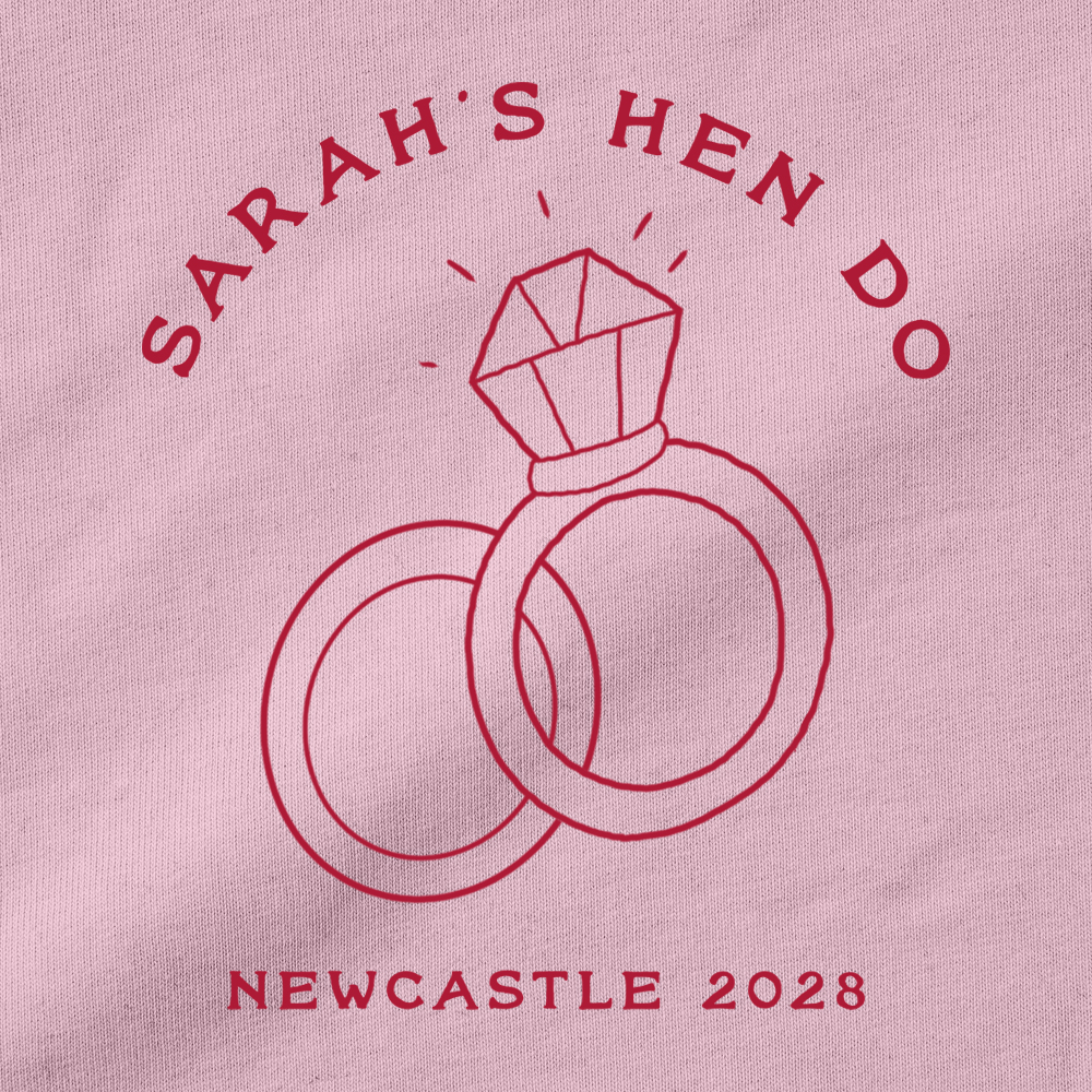 A close up of a pocket design with two interlinking rings with custom text Sarah's Hen Do Newcastle 2028
