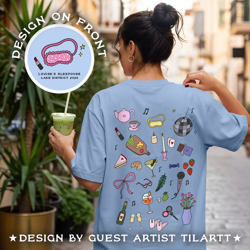 The back of a custom hen do t-shirt with a doodle design with sleepover-themed doodles including a lipstick, a cheeseboard, a candle, some strawberries, a vase of flowers and more. 