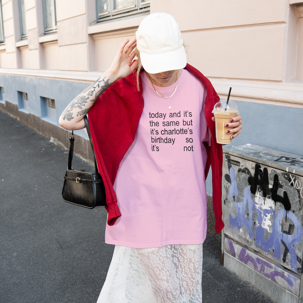 The back of a white t-shirt that reads name here along with the number 11