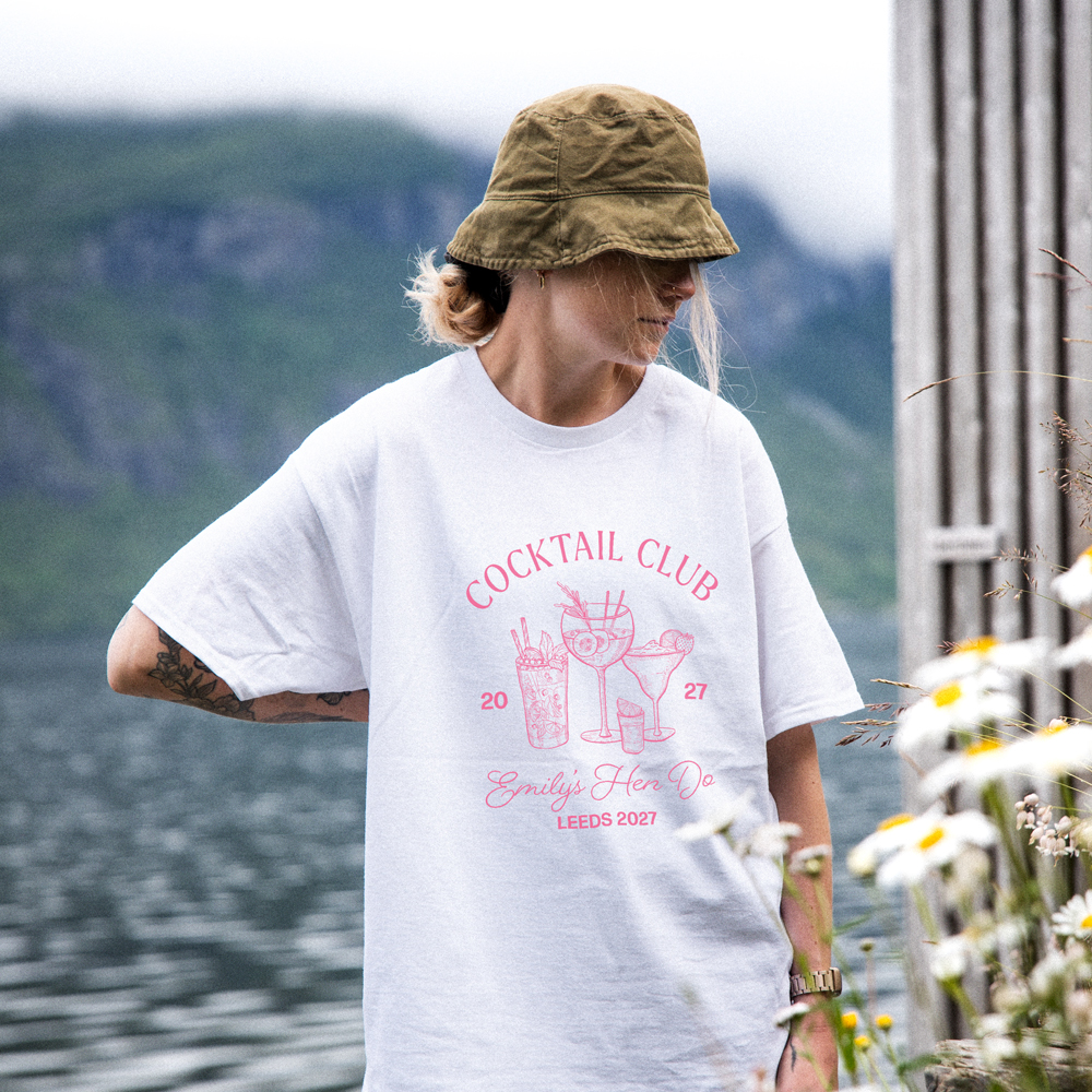 The back of a white t-shirt that reads name here, 12